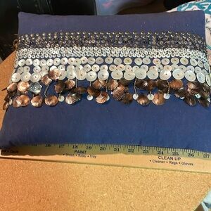 Shell accent pillow